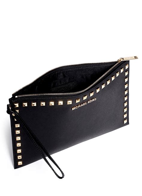 michael kors clutch lack|Michael Kors studded clutch.